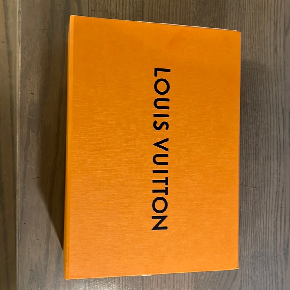 Brand new Louis Vuitton box with tissue paper and ribbon